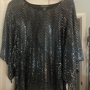 Black silver sequins top. Butterfly sleeves.
